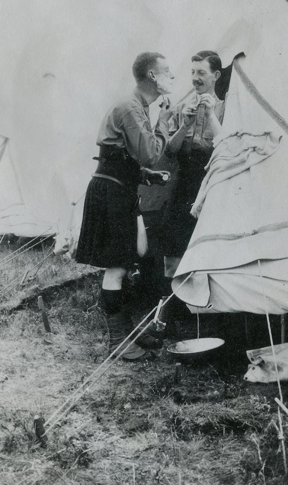 Private John Denholm (holding the mirror) at Sewell Camp in late June 1914 