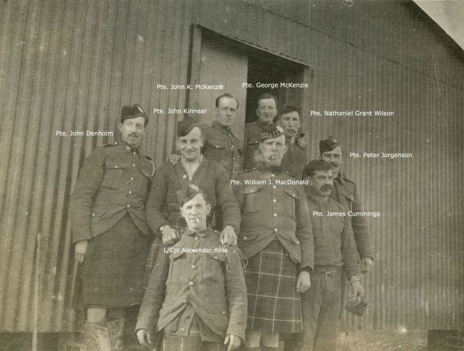 "Chums in the Hut" - a photo from Pte John Denholm's First World War scrapbook